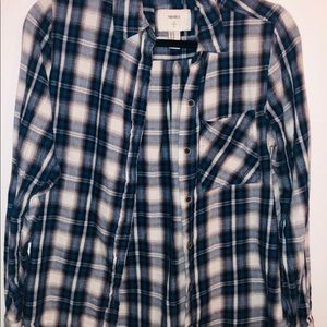 A blue, grey and white flannel.